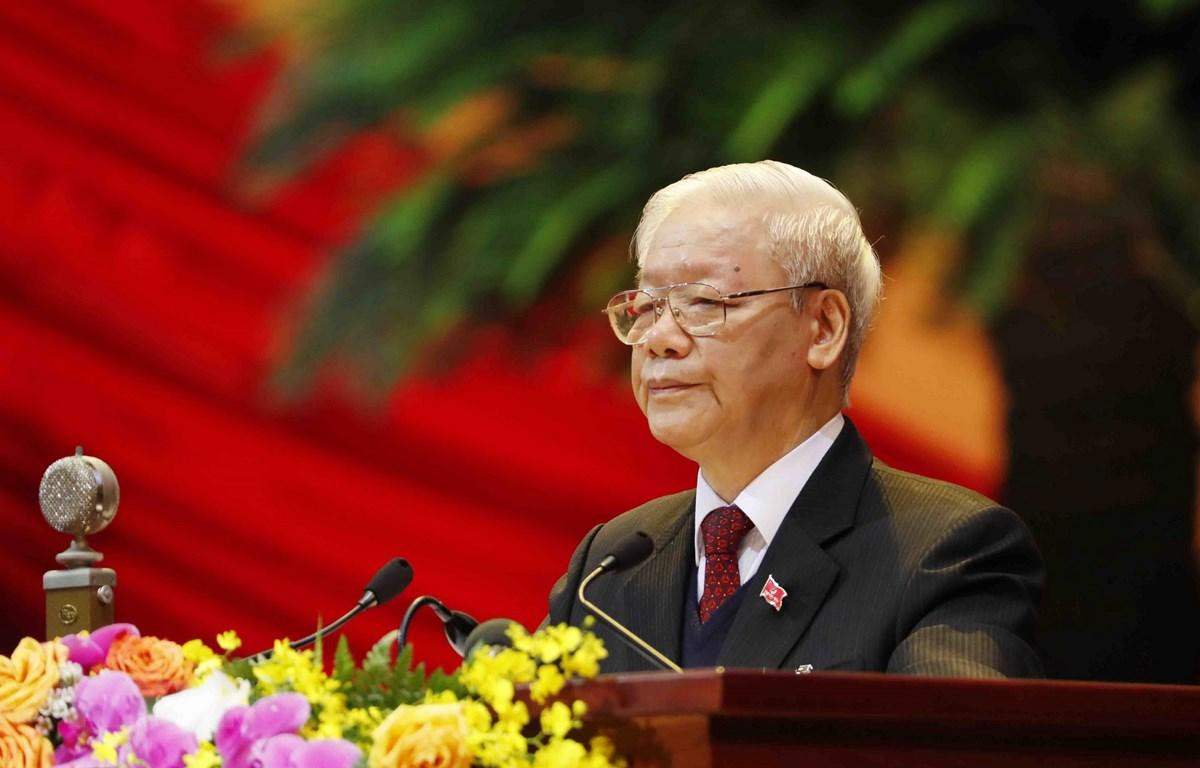 Đồng chí Nguyễn Phú Trọng, Tổng Bí thư Ban Chấp hành Trung ương Đảng, Chủ tịch nước Cộng hòa Xã hội Chủ nghĩa Việt Nam đọc Báo cáo chính trị của Ban Chấp hành Trung ương Đảng khóa XII và các văn kiện trình Đại hội. (Ảnh: TTXVN)