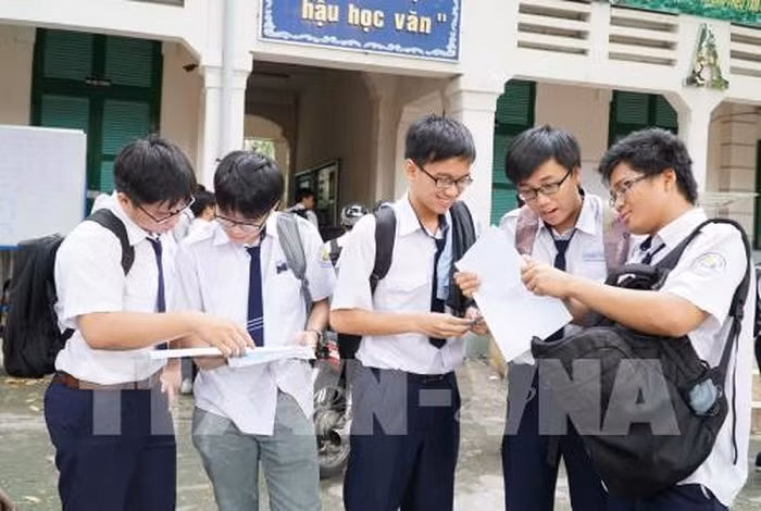 Thi chưa xong không nên dò đáp án (Ảnh minh họa: TTXVN).