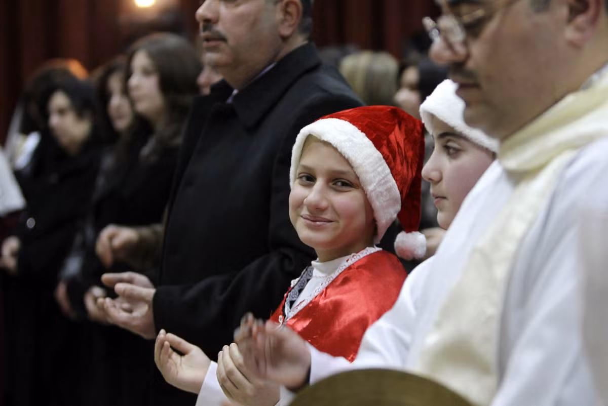 Các Kito hữu cầu nguyện trong đêm Giáng sinh tại nhờ thờ Chadean Catholic ở Amman, Iraq