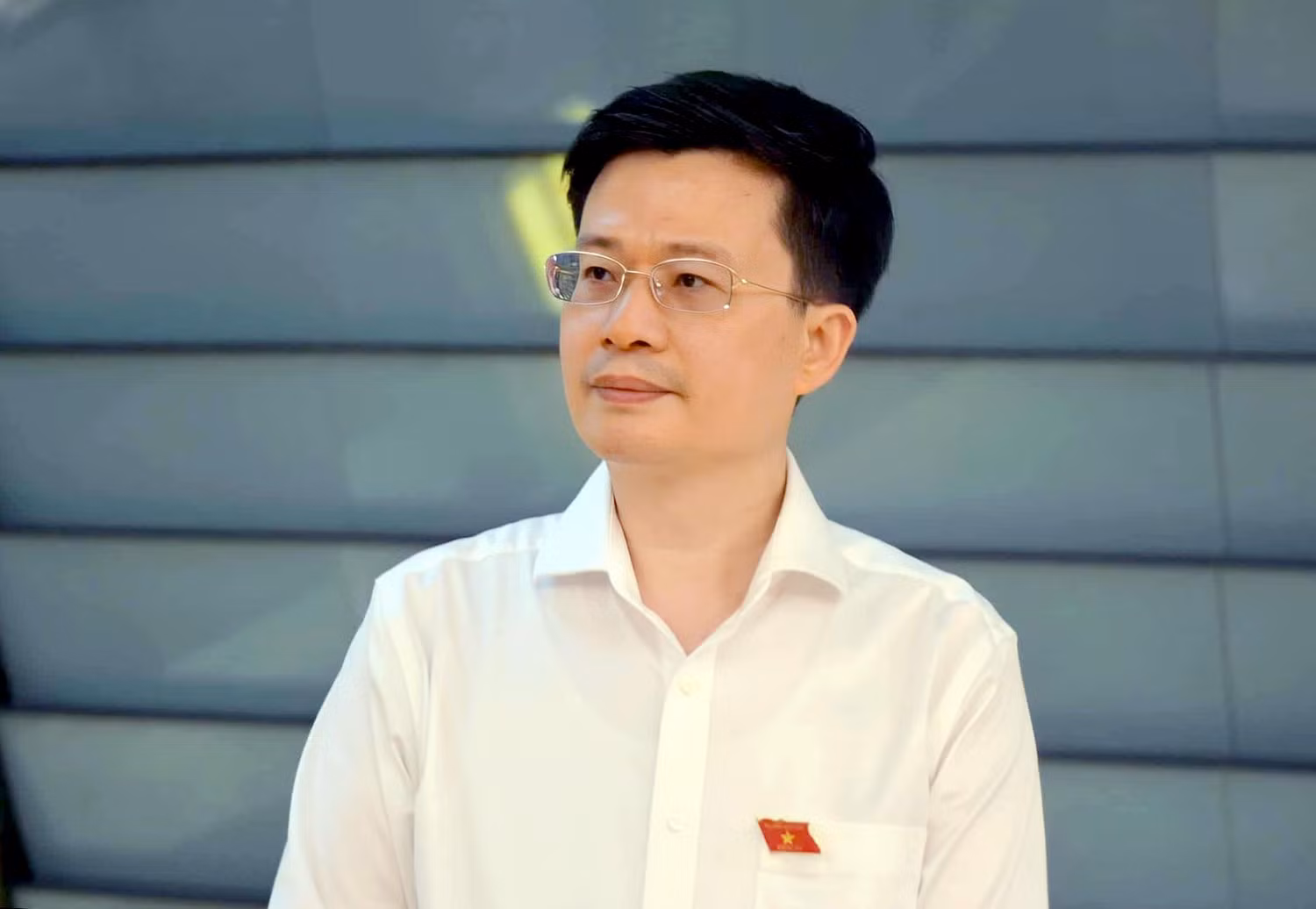 Đại biểu Quốc hội Đỗ Chí Nghĩa, Ủy viên Thường trực Ủy ban Văn hoá, Giáo dục của Quốc hội lý giải một số nguyên nhân khiến tốc độ di dời trường đại học ra khỏi nội đô diễn ra chậm. Ảnh: Thanh Lam.