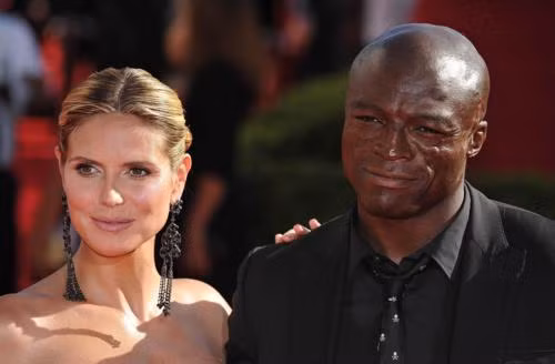 Heidi Klum và Seal với nhẫn kim cương 10 cara trị giá 1.5 triệu USD. Ảnh. AFP. Heidi Klum và Seal với nhẫn kim cương 10 cara trị giá 1.5 triệu USD. Ảnh. AFP.