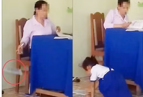 Một hành động ném vở của học sinh xuống đất, không phù hợp của cô N.T.T (ảnh cắt từ video clip) Một hành động ném vở của học sinh xuống đất, không phù hợp của cô N.T.T (ảnh cắt từ video clip)