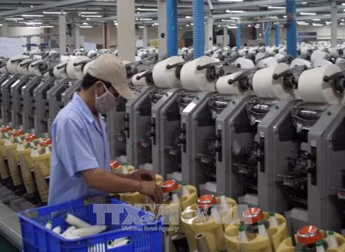 Sản xuất sợi xuất khẩu của Công ty Cổ phần Sợi Phú Bài - Huế. Ảnh: Quốc Việt/TTXVN Sản xuất sợi xuất khẩu của Công ty Cổ phần Sợi Phú Bài - Huế. Ảnh: Quốc Việt/TTXVN