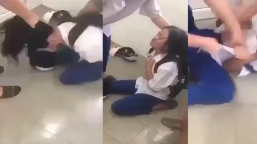 Nữ sinh bị bạo lực học đường ở Quảng Trị.. Ảnh cắt ra từ clip Nữ sinh bị bạo lực học đường ở Quảng Trị.. Ảnh cắt ra từ clip