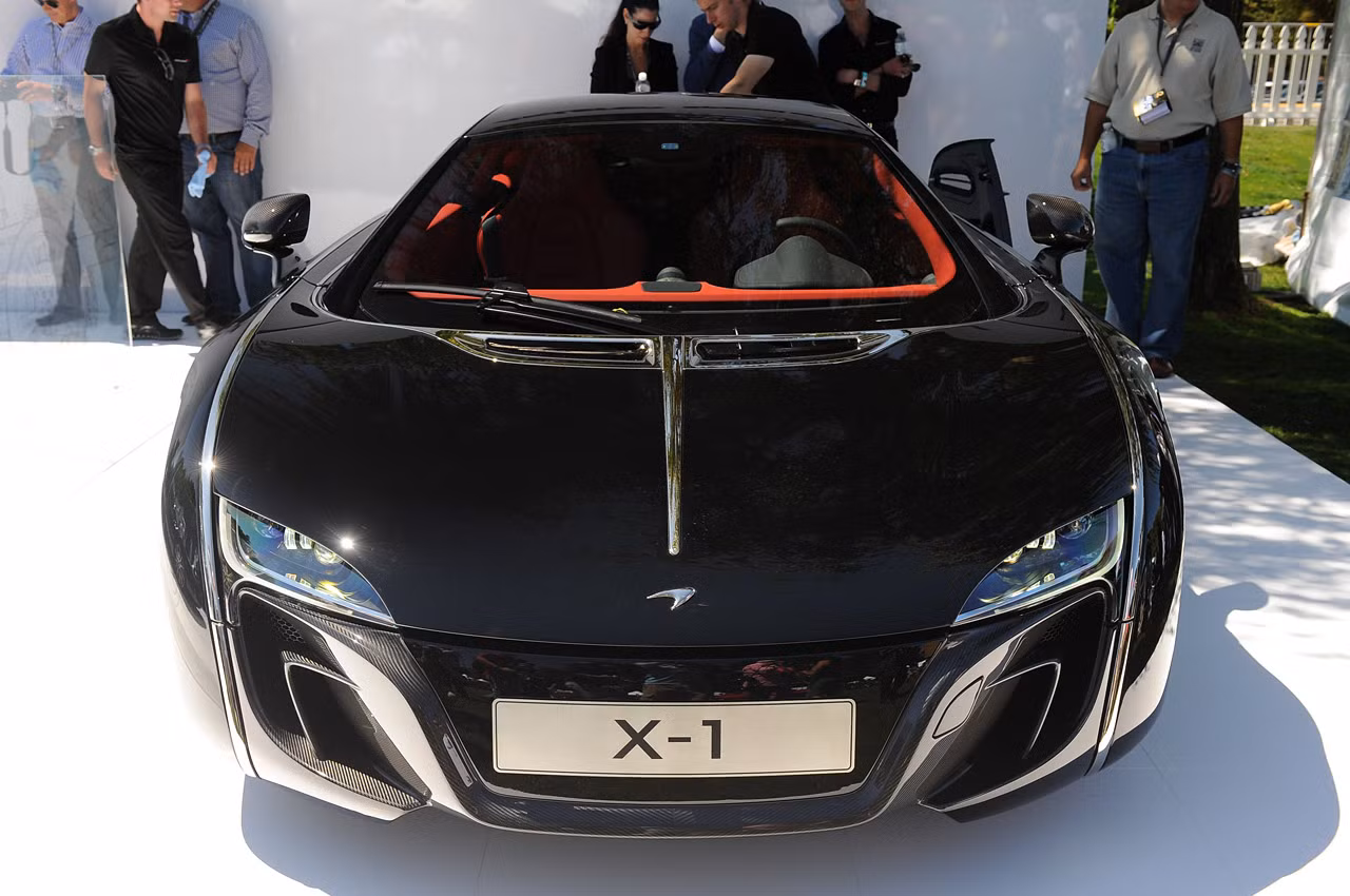 Theo ông Frank Stephenson, giám đốc bộ phận thiết kế MCLaren, kế hoạch cho ra mắt X-1 hình thành từ 3 năm trước, khi một khách hàng giấu tên đến McLaren Special Operations - một đơn vị chịu trách nhiệm phân phối các dự án độc đáo, đưa ra ý định xây dựng một chiếc siêu xe độc nhất vô nhị. Theo ông Frank Stephenson, giám đốc bộ phận thiết kế MCLaren, kế hoạch cho ra mắt X-1 hình thành từ 3 năm trước, khi một khách hàng giấu tên đến McLaren Special Operations - một đơn vị chịu trách nhiệm phân phối các dự án độc đáo, đưa ra ý định xây dựng một chiếc siêu xe độc nhất vô nhị.
