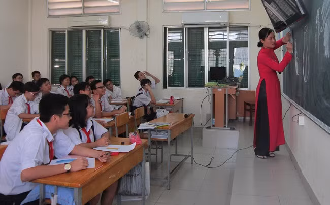 Giáo viên bị xếp không hoàn thành nhiệm vụ trong năm học sẽ bị kéo dài thời hạn nâng bậc lương thường xuyên lên đến 6 tháng (Ảnh mang tính chất minh họa: TTXVN).