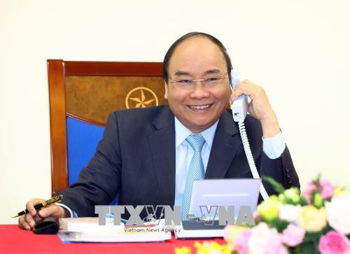 Thủ tướng Nguyễn Xuân Phúc gọi điện chúc mừng đội tuyển U23 Việt Nam thắng đội tuyển Qatar bước vào trận chung kết U23 châu Á. Ảnh: TTXVN. Thủ tướng Nguyễn Xuân Phúc gọi điện chúc mừng đội tuyển U23 Việt Nam thắng đội tuyển Qatar bước vào trận chung kết U23 châu Á. Ảnh: TTXVN.